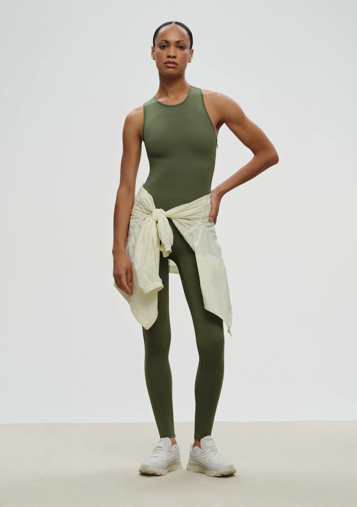 /uploads/NRB_ASL_s_Asymmetric_Leotard_in_Sage_a68a562fda.webp